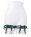 Sex & Mischief Indica Laced Up Garter Green displayed on a mannequin, featuring emerald faux leather and satin laces.