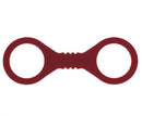 Sex & Mischief Enchanted Silicone Cuffs Small Red in deep red hue with two circular openings for secure wrist restraint.