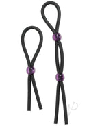 Silicone Cock Tie and C/B Tie Black with adjustable purple beads for enhanced pleasure and performance, super stretchy and hygienic.