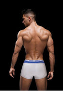 Model showcasing the Envy Sporty Lace Up Trunk White S M from the back, highlighting its fit and design.
