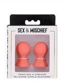 Peaches N Creame Silicone Nipple Suckers in packaging, designed for heightened pleasure and sensual play.
