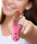 Super Fun Key Chain Penis Flashlight held by a smiling person, adding novelty to keyrings.