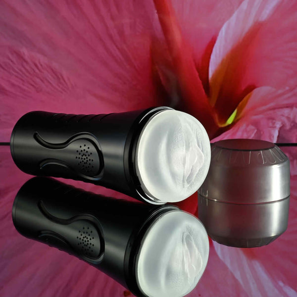 Zero Tolerance Hold Tight vibrating stroker with realistic vaginal entry against a pink floral background