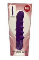 Fun Factory Stronic Surf Thrusting Pulsator Dark Violet in packaging, featuring wave-like design and ergonomic shape.