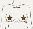 Happy New Year Pasties 2026 Black & Gold Star Nipple Covers on a model's torso with stars design