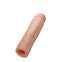 Beige silicone penis extender with realistic dual density design for enhanced performance.