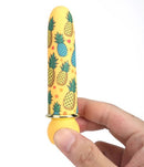 Maia Kona Rechargeable Bullet Vibrator Pineapple Print in hand showcasing its vibrant pineapple design.
