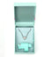 The Love Box by Maia Novelties featuring a heart-shaped pendant and Jaguar Bullet Vibrator in a stylish mint gift box.