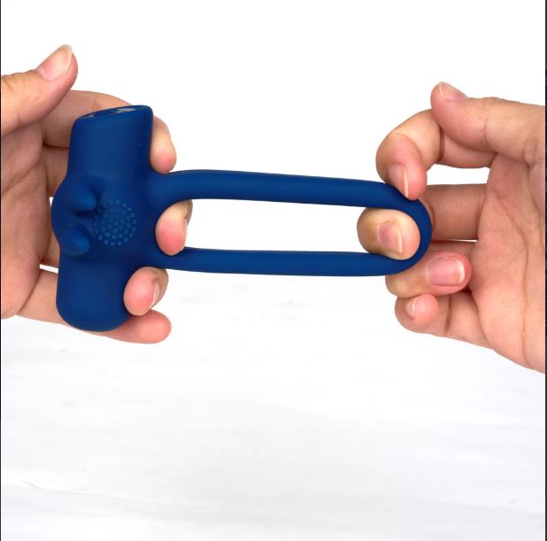 Maia Huxley Blue Liquid Silicone C Ring Jaguar being held in hands, showcasing its design and fit.