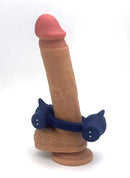 Maia Ronan Power Liquid Silicone C Ring Blue on a realistic dildo model for enhanced pleasure.