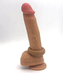 Maia Gunner Caramel Liquid Silicone C ring shown on a lifelike silicone model, enhancing pleasure and performance.