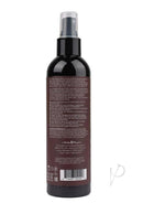 Earthly Body Hemp Seed Moisturizing Oil Spray Skinny Dip 8oz bottle with ingredients listed on back