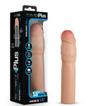 Beige Performance Plus 1.25-Inch Silicone Penis Extender with realistic feel, displayed alongside packaging showing features and size.