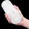 Hand holding MAXTASY Show Master Pleasure Stamina Trainer with ultra-soft sleeve