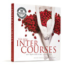 The New Intercourses An Aphrodisiac Cookbook featuring strawberries, a seductive culinary guide.