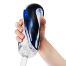 Tenga Flip 360 Midnight Purple Masturbator held in hand, showcasing its ergonomic design.