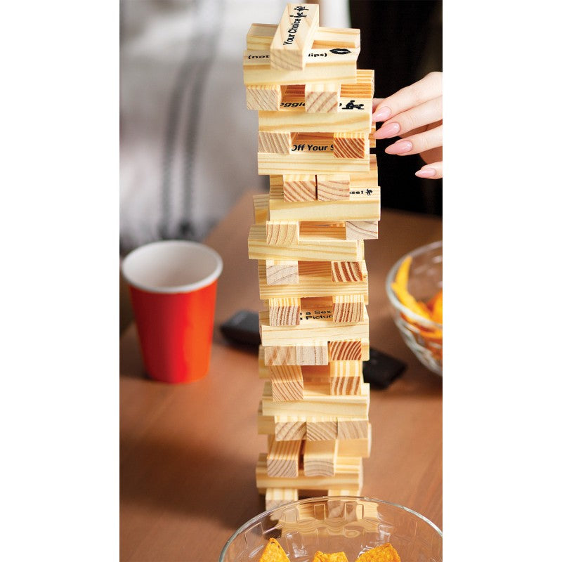 Tower Tease Table Adult Game with stacked wooden blocks and colorful cup in a lively party setting.