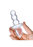 Glas Titus Beaded Butt Plug Clear held in hand, showcasing its elegant beaded design for enhanced stimulation.
