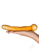 Glas Orange Tickler Glass Dildo held in hand, showcasing its elegant design and vibrant color.