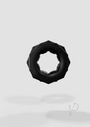 Bathmate Spartan Power Ring Cock Ring Black displayed against a gray background, showcasing its sleek design.