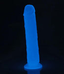 Glow in The Dark Flexible Dildo 8.5 inches Blue illuminated against a dark background.