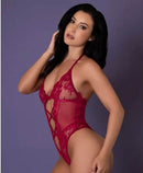 Model wearing the Magic Silk Black Cherry Halter Teddy Cherry L XL, showcasing its seductive design with lace and fishnet.