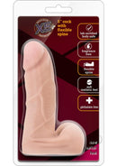 X5 Plus Cock Dildo with Balls 5.5 Inch Vanilla in packaging with flexible spine and realistic detail.