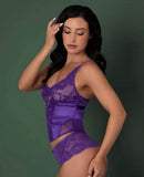 Magic Silk Satin Petals Bustier & Boy Short Set Purple S M model wearing purple satin lingerie set.