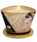 Shunga Massage Candle Desire Vanilla 5.7 Oz with a warm flame, designed for a romantic massage experience.