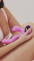 FemmeFunn Pallina Triple Action Thumping Rabbit Vibrator Dark Green held by a person showcasing its design and features.