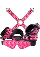 Sinful Bondage Vinyl Kit (Set of 4) Pink featuring cuffs and blindfold for BDSM exploration.