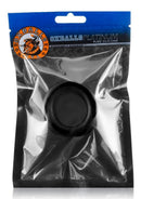 Oxballs Atomic Jock Balls-T Silicone Ball Stretcher Black packaging on display.