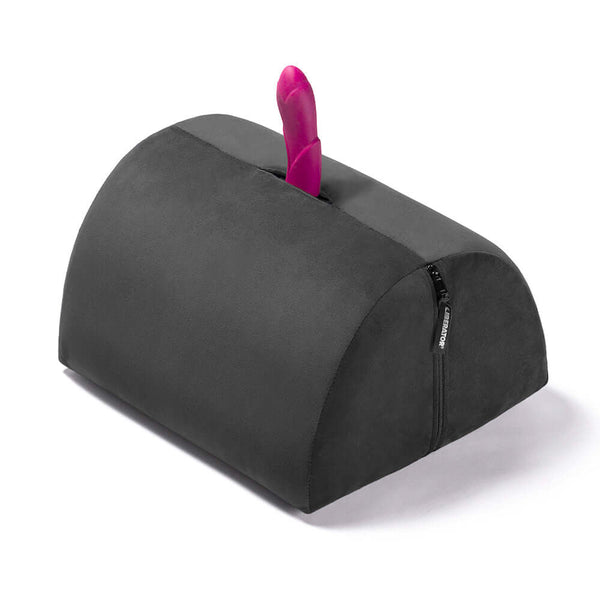 Liberator Bonbon Sex Toy Mount Black with a pink toy inserted, designed for comfort and hands-free pleasure.