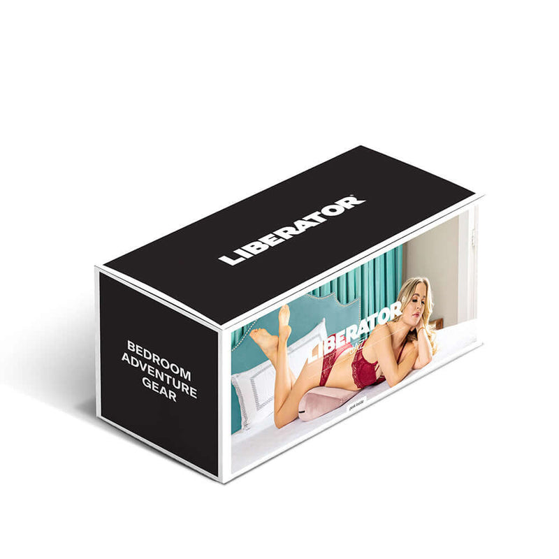 Liberator Jaz Original Sex Pillow Rose packaging with model on a bed showcasing bedroom adventure gear.