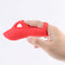 Lana Liquid Silicone Finger Vibrator Red by Maia Toys held in hand, showcasing its ergonomic design and smooth silicone.