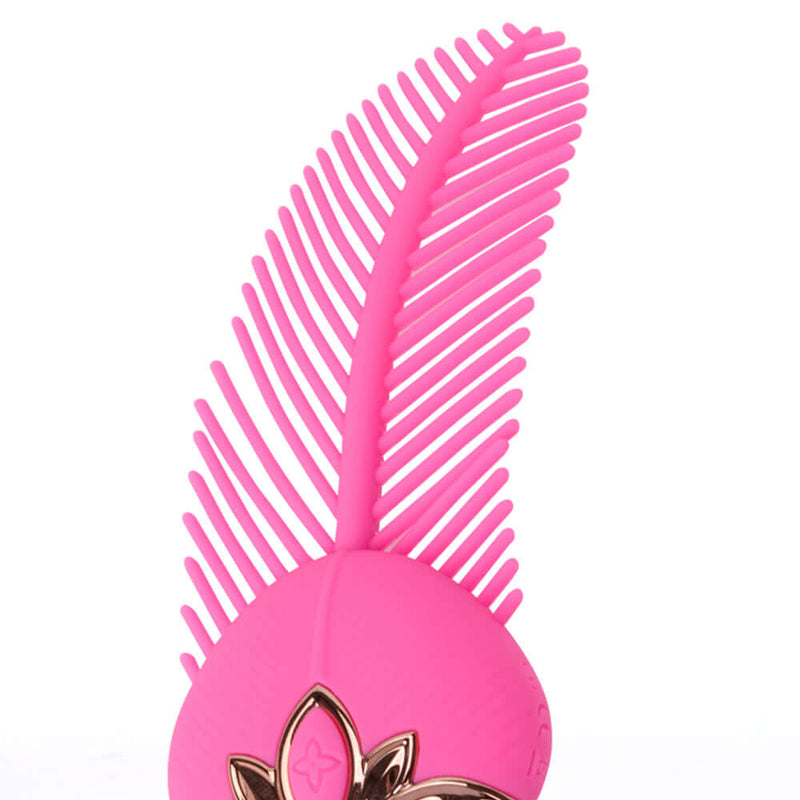 Rayne Silicone Feather Vibrator Pink by Maia Toys, featuring a soft silicone design and elegant feather shape.