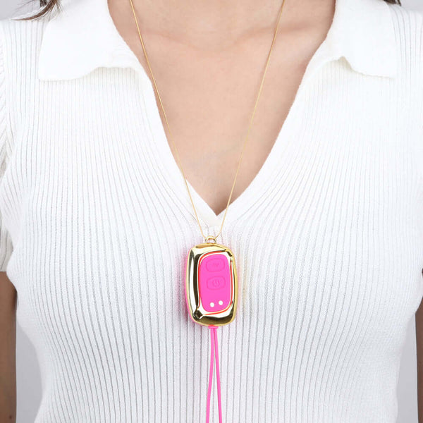 Molli Vibrating Nipple Clamps and Necklace Pink by Maia Toys showcased as a stylish accessory on a model.