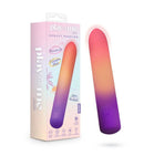 Play With Me Sunset Passion Rechargeable Silicone Vibrator in its packaging, featuring a sleek design and gradient colors.
