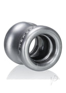 Oxballs Squeeze Soft Grip Ball Stretcher Silver angled view showcasing the unique hourglass design and shiny finish.
