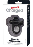 Charged Skooch Vibrating Silicone Cock Ring Black in packaging, designed for couples' stimulation.