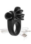 Charged Skooch Vibrating Silicone Cock Ring Black with textured fins and charging cable.