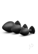 Luxe Bling Silicone Anal Training Kit Red Gems Black - three black silicone anal plugs in varying sizes.