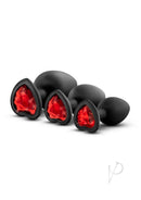 Luxe Bling Silicone Anal Training Kit Red Gems Black featuring three progressively sized plugs with red gem bases.