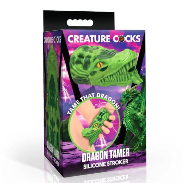 Creature Cocks Dragon Tamer Silicone Stroker Green packaging with dragon head design and hand holding stroker.