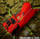 Creature Cocks Dragon Tamer Silicone Stroker Red dimensions on textured background showing size details.