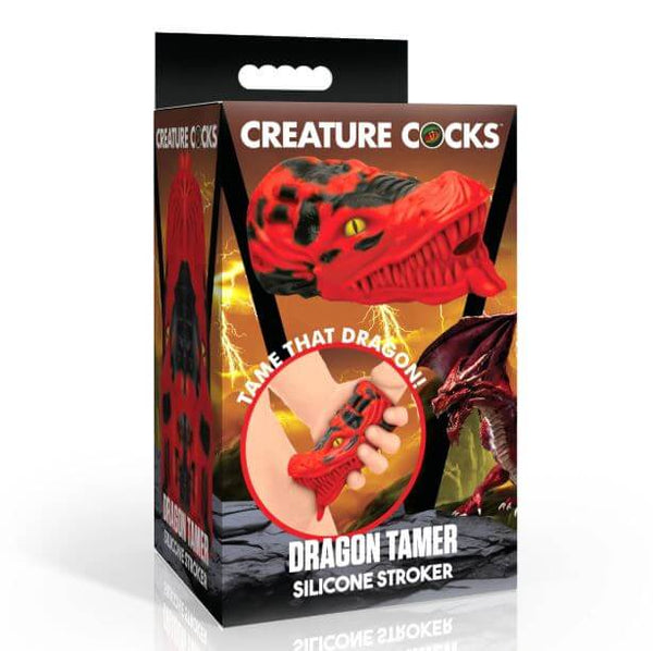 Creature Cocks Dragon Tamer Silicone Stroker Red packaging with dragon head design and text on a fantasy background.