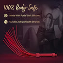 Temptasia Ardor Silicone Flogger Red showcasing silky strands and body-safe silicone design.