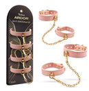 Temptasia Ardor Silicone Wrist and Ankle Restraints Pink set displayed with gold accents and elegant design.