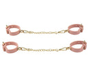 Temptasia Ardor Silicone Wrist and Ankle Restraints Pink with gold chains for bondage experience.