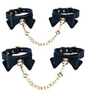 Temptasia Ardor Silicone Wrist & Ankle Restraints with Bow Black featuring gold chain and elegant design.
